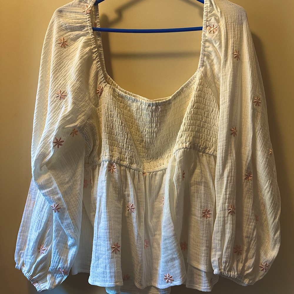 Pink Lily Cropped Bandeau Long Sleeve Babydoll Top with pink embroidered flowers